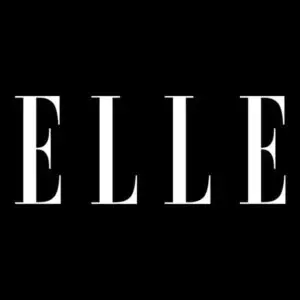 Empowering Elle magazine logo on a black background.