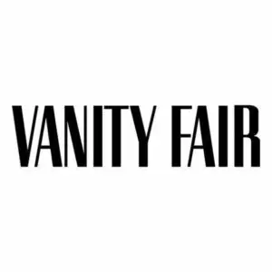 Logo of Vanity Fair magazine displayed in bold, black uppercase letters on a white background, promoting empowering homeless city tours.