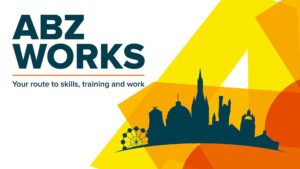 Text graphic with "ABZ Works" and "Your route to skills, training and work." Features a silhouette of various buildings and a Ferris wheel on a colorful geometric background.