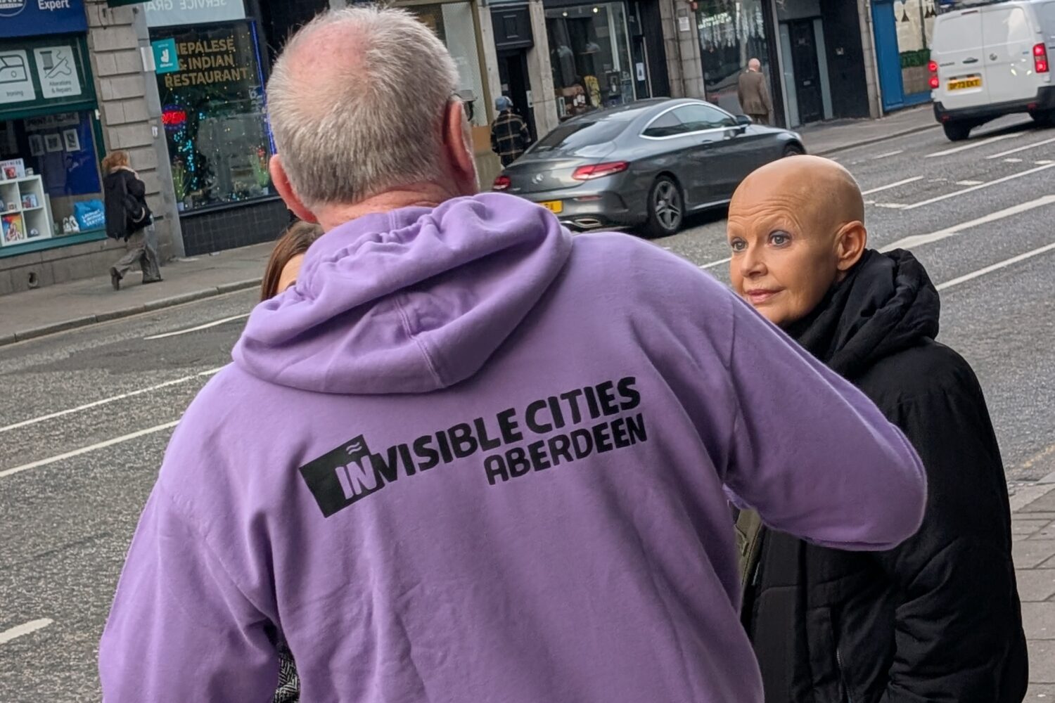 Invisible Cities Aberdeen walking tour guide Angus with tour guest Gail Porter